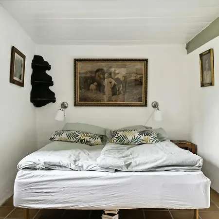 Unique Summer House With Seaweed Roof On