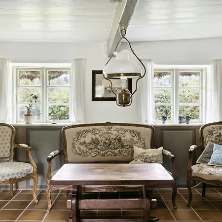 Unique Summer House With Seaweed Roof On Laeso