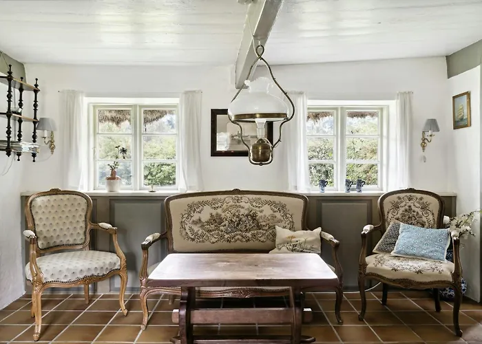 Unique Summer House With Seaweed Roof On Laeso
