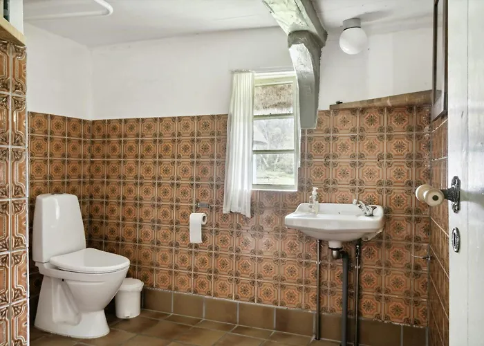 Unique Summer House With Seaweed Roof On Laeso